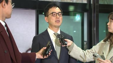 '집단 반발' 전보 검토 논란...구자현 묵묵부답 출근