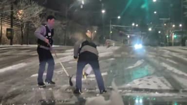 제설장비 든 경찰들...언덕에서 차 밀어주면서 구슬땀