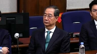 한덕수, 꼿꼿이 한숨만..."결정에 겸허히 따르겠다"