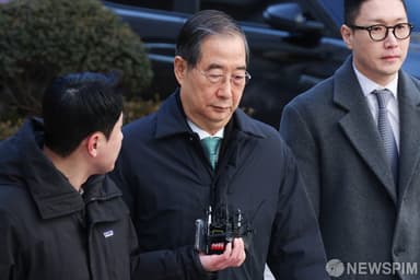 "12·3 내란은 尹의 쿠데타"…선고 순간, 법정은 숨죽였고 한덕수 얼굴만 붉어졌다